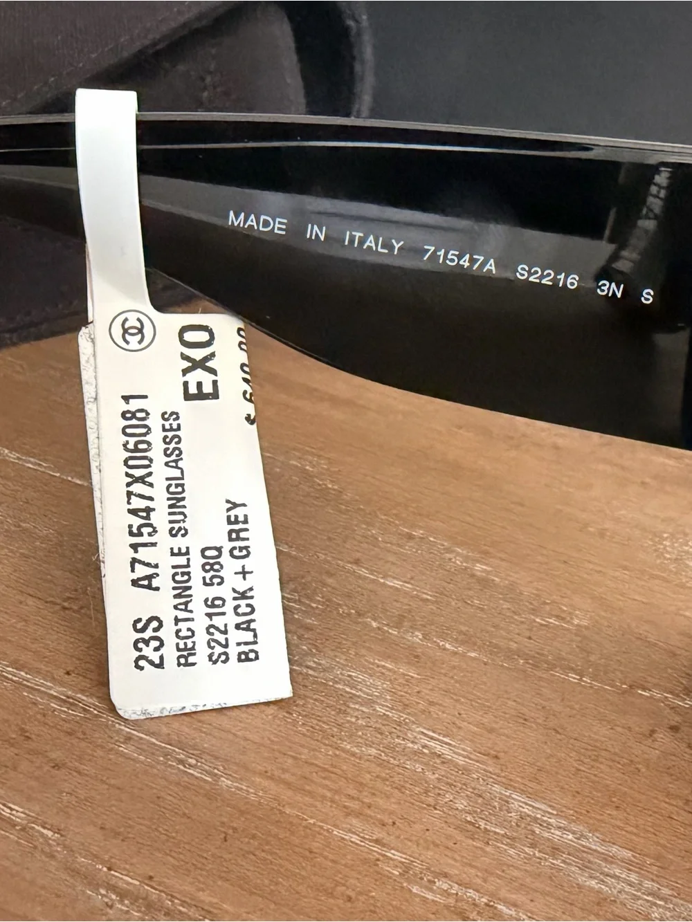 CHANEL Black Cat-Eye Sunglasses with Gold Accent and Gradient Gray Lenses
